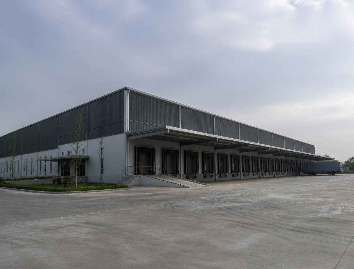 Large modern industrial warehouse and logistics facility